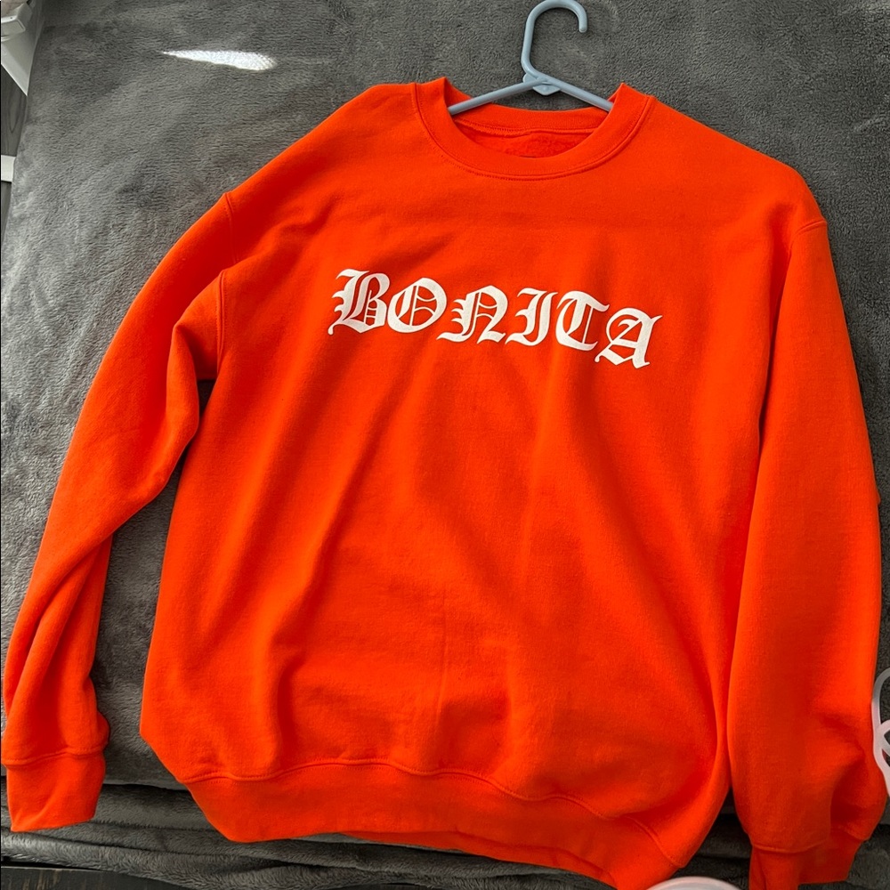 Orange crewneck sweater